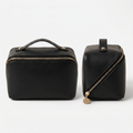 Svart Compact Manorella Sminkebag